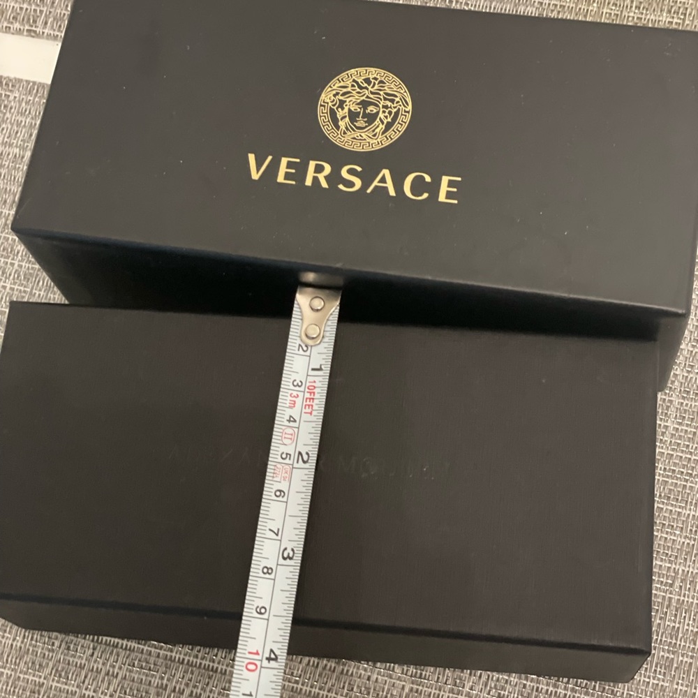 Versace and Alexander McQueen glasses paper box